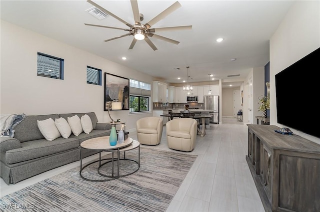 living room with ceiling fan