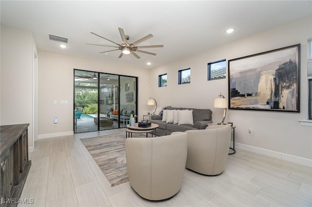 living room featuring ceiling fan