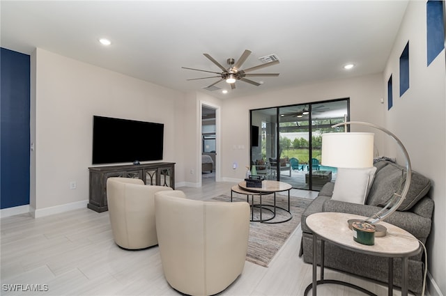 living room with ceiling fan