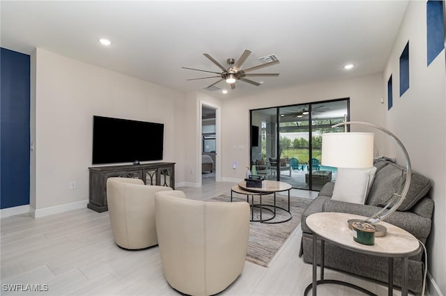 living room featuring ceiling fan