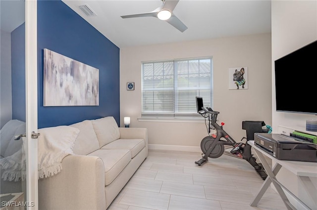 interior space featuring ceiling fan