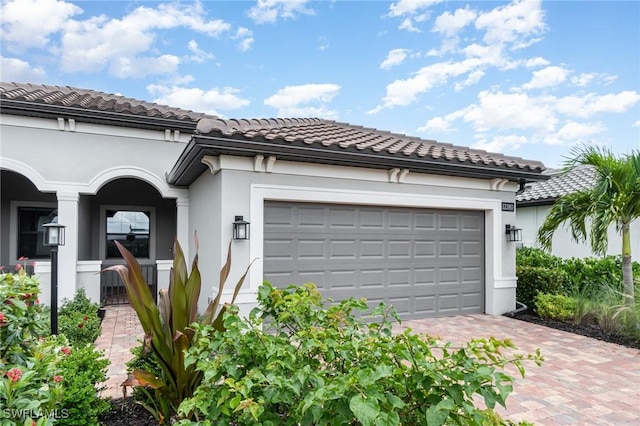 view of front of property featuring a garage