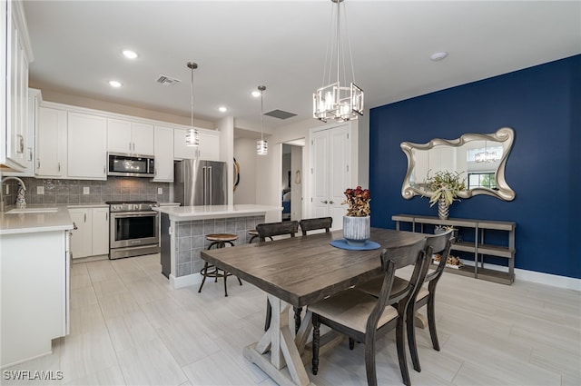 dining space featuring sink