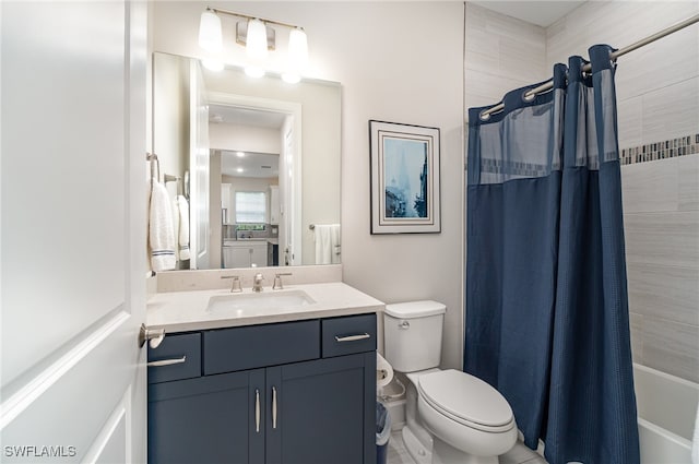 full bathroom featuring toilet, vanity, and shower / tub combo with curtain