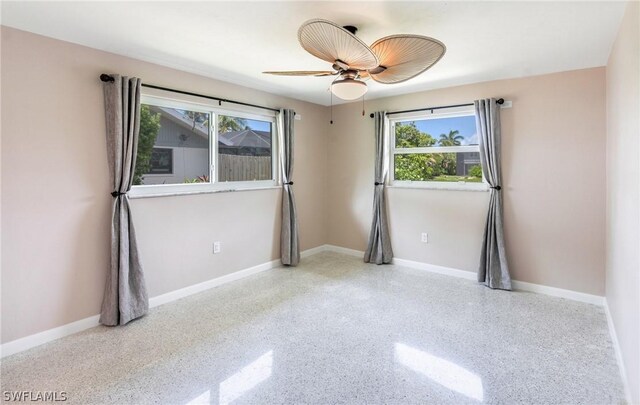 spare room featuring ceiling fan