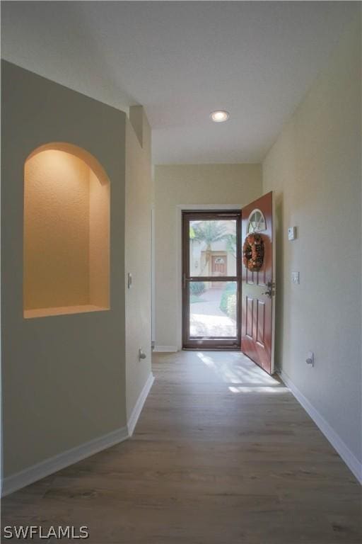 interior space with hardwood / wood-style flooring