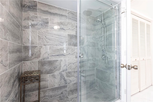 bathroom featuring an enclosed shower