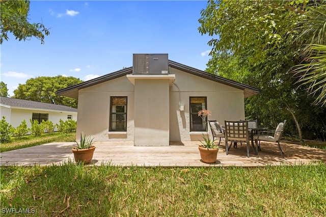 back of house with a patio