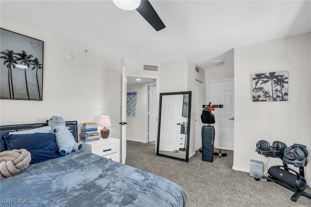 bedroom featuring light colored carpet and ceiling fan