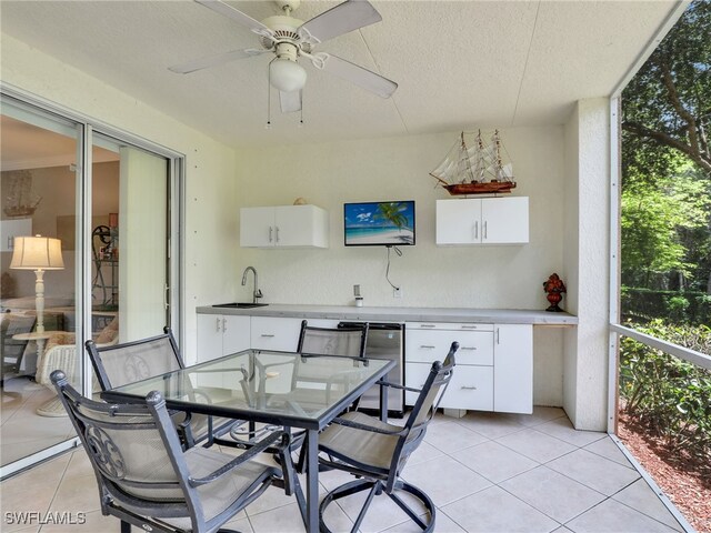 view of patio with sink and ceiling fan