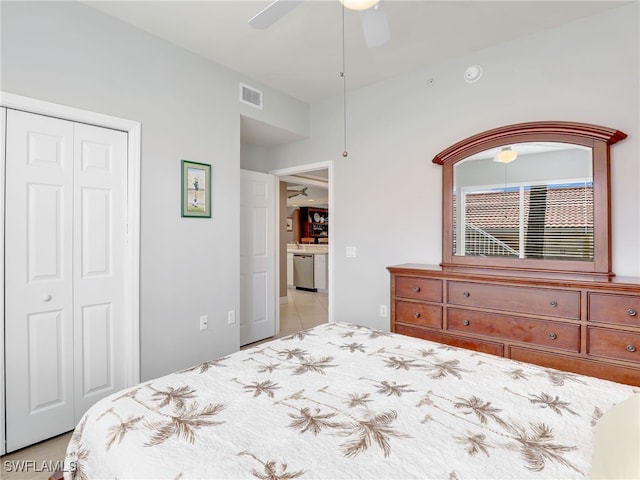 tiled bedroom with a closet and ceiling fan