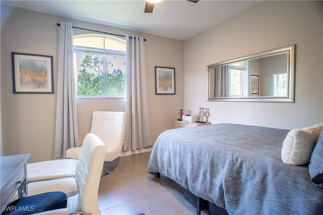 bedroom featuring ceiling fan and light tile patterned floors