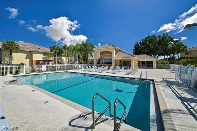 view of swimming pool featuring a patio area