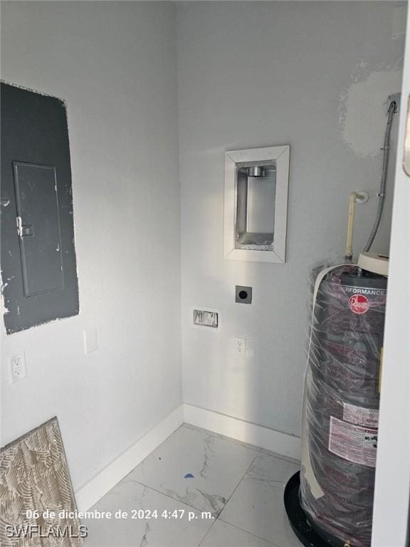 2801 48th St W, Lehigh Acres, FL 33971 - laundry area featuring marble finish floor, laundry area, electric panel, baseboards, and electric dryer hookup