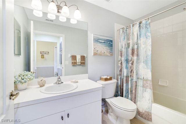 full bathroom with vanity, shower / bath combo with shower curtain, and toilet