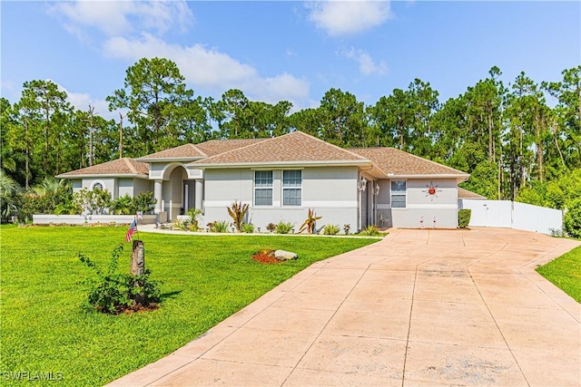 view of front of property with a front lawn