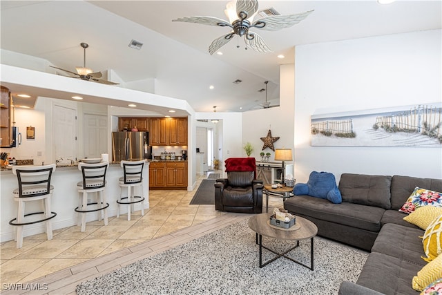 living room with high vaulted ceiling and ceiling fan