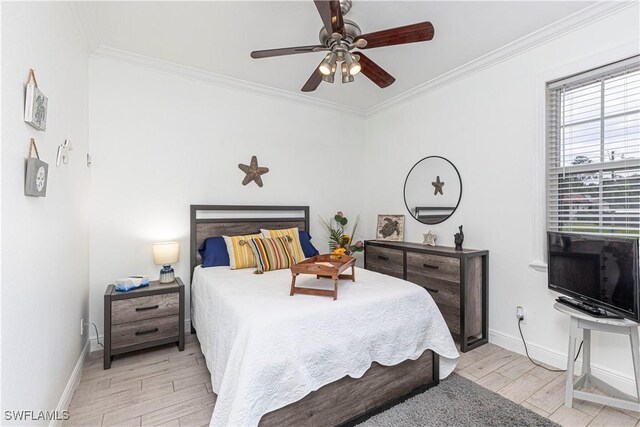 bedroom featuring crown molding, ceiling fan, and light wood-type flooring