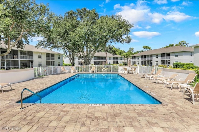 view of pool featuring a patio area