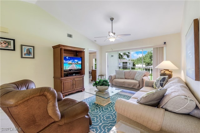 living room with light tile patterned floors, vaulted ceiling, and ceiling fan