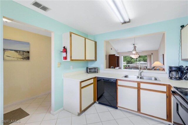 kitchen featuring light tile patterned flooring, hanging light fixtures, sink, stainless steel stove, and dishwasher