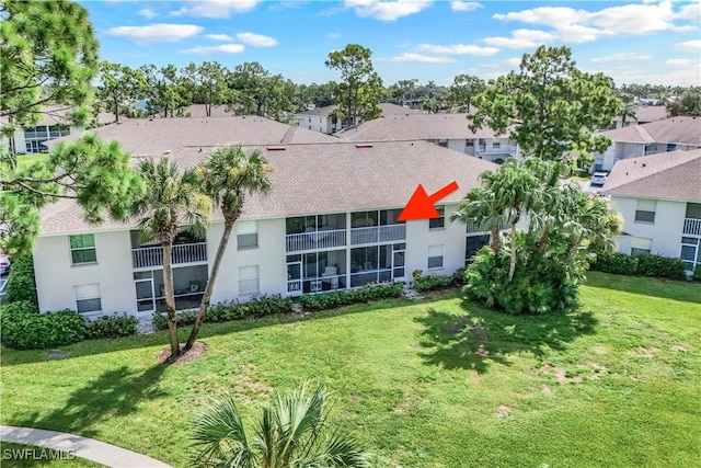 view of property with a residential view