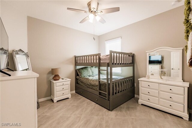 bedroom featuring ceiling fan and light tile patterned floors