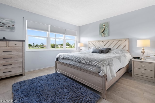 bedroom featuring a textured ceiling