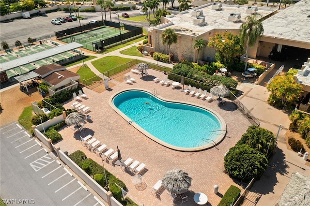 view of swimming pool featuring a patio area