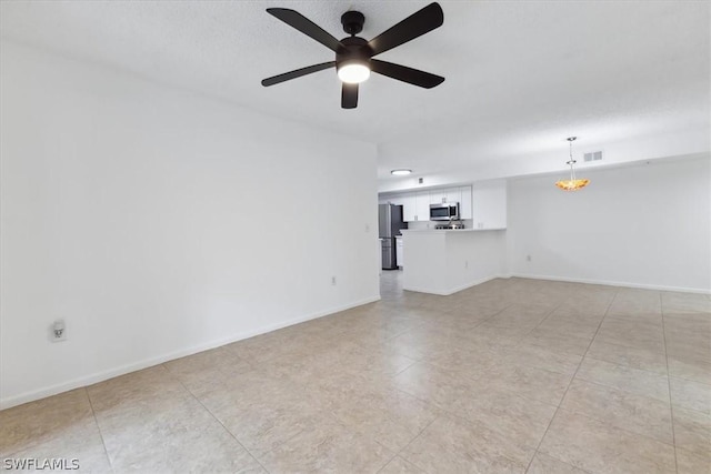 unfurnished living room featuring ceiling fan