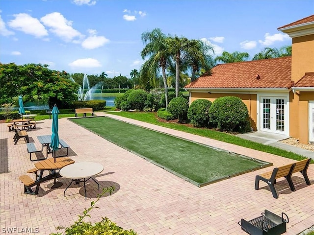 view of home's community featuring a water view