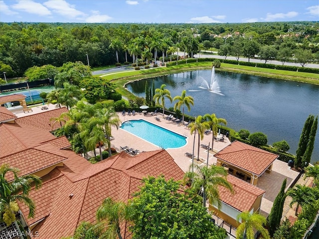 view of swimming pool with a water view