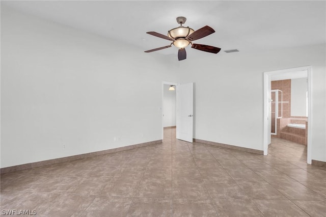 unfurnished room featuring ceiling fan