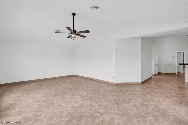 spare room featuring ceiling fan and lofted ceiling