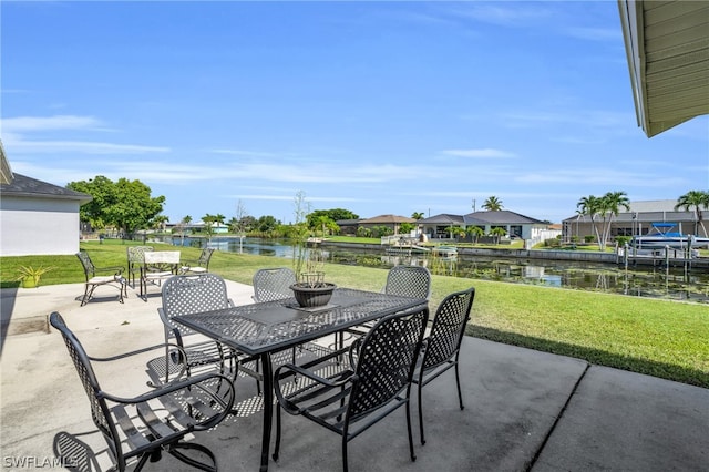 view of patio with a water view