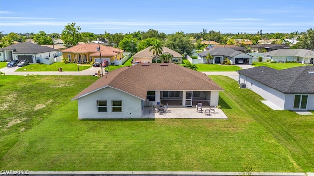 back of property featuring a patio area