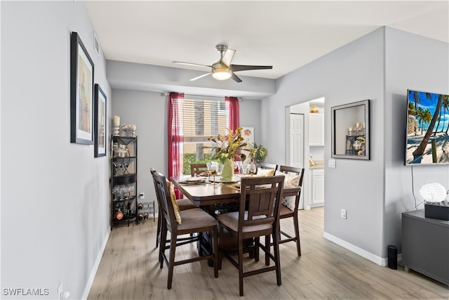 dining room featuring light wood-type flooring and ceiling fan