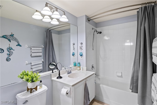 full bathroom featuring vanity, shower / tub combo, and toilet