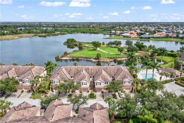 birds eye view of property featuring a water view