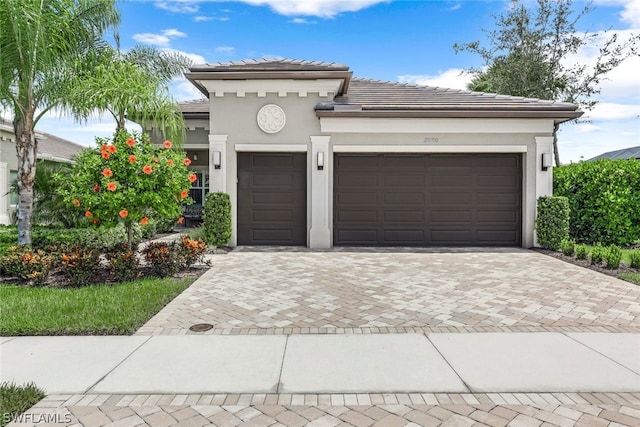 view of front of home with a garage