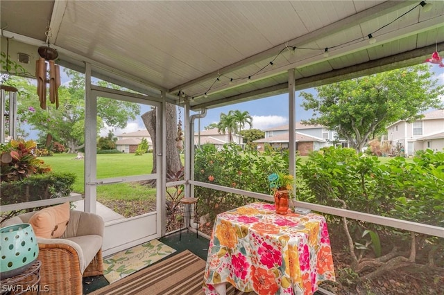 sunroom with plenty of natural light