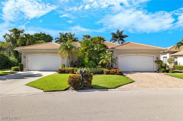 view of front of property with a garage