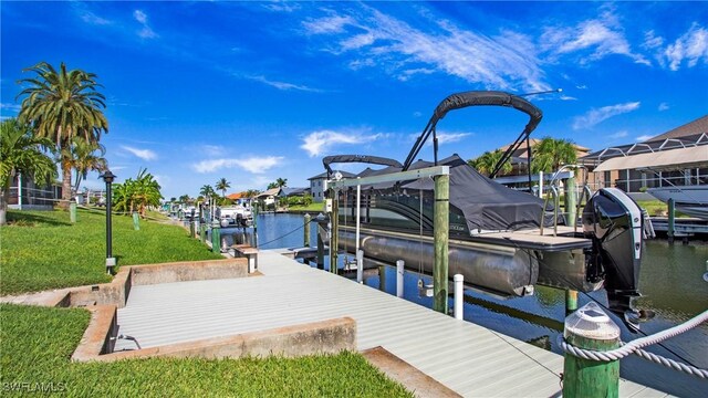 view of dock featuring a yard and a water view