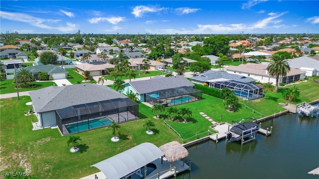 bird's eye view with a water view