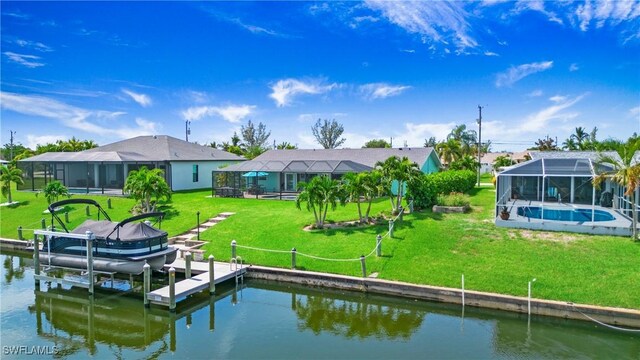 view of dock with a yard, a lanai, and a water view