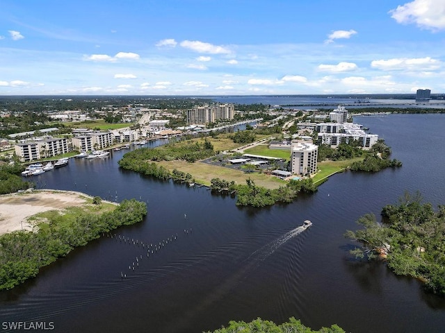 aerial view with a water view and a city view