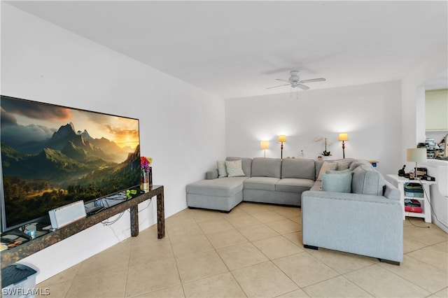 tiled living room with ceiling fan