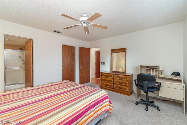4109 SE 19th Ave Unit 207, Cape Coral, FL 33904 - carpeted bedroom with visible vents, ceiling fan, and a textured ceiling
