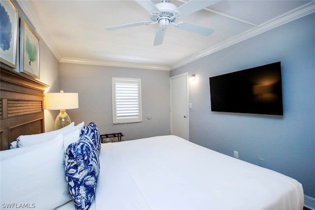 bedroom featuring ceiling fan and crown molding