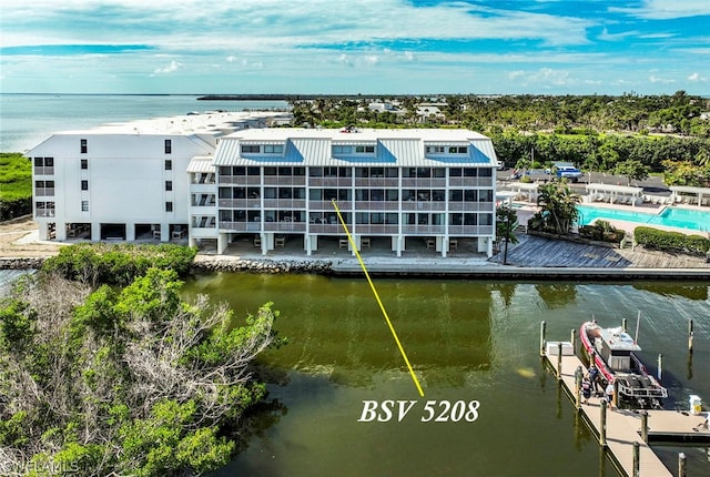 view of building exterior featuring a water view